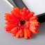 Hoa giả Gerbera đang nở (đỏ cam)